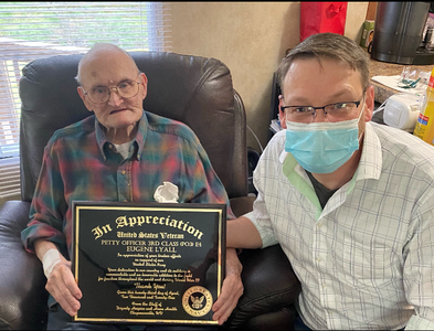 A Special Plaque to Veteran Eugene Lyall